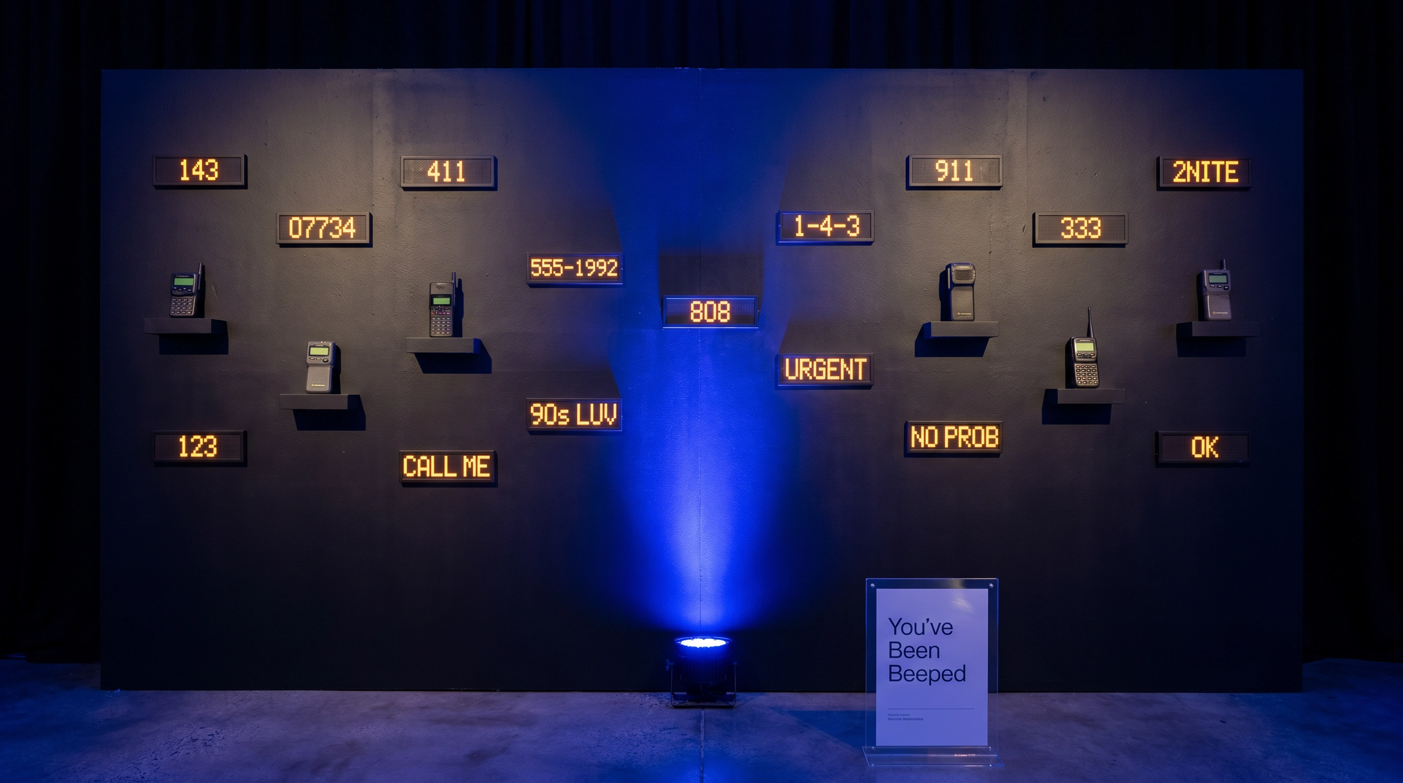 An interactive pager backdrop creates the perfect first photo opportunity for guests upon arrival.