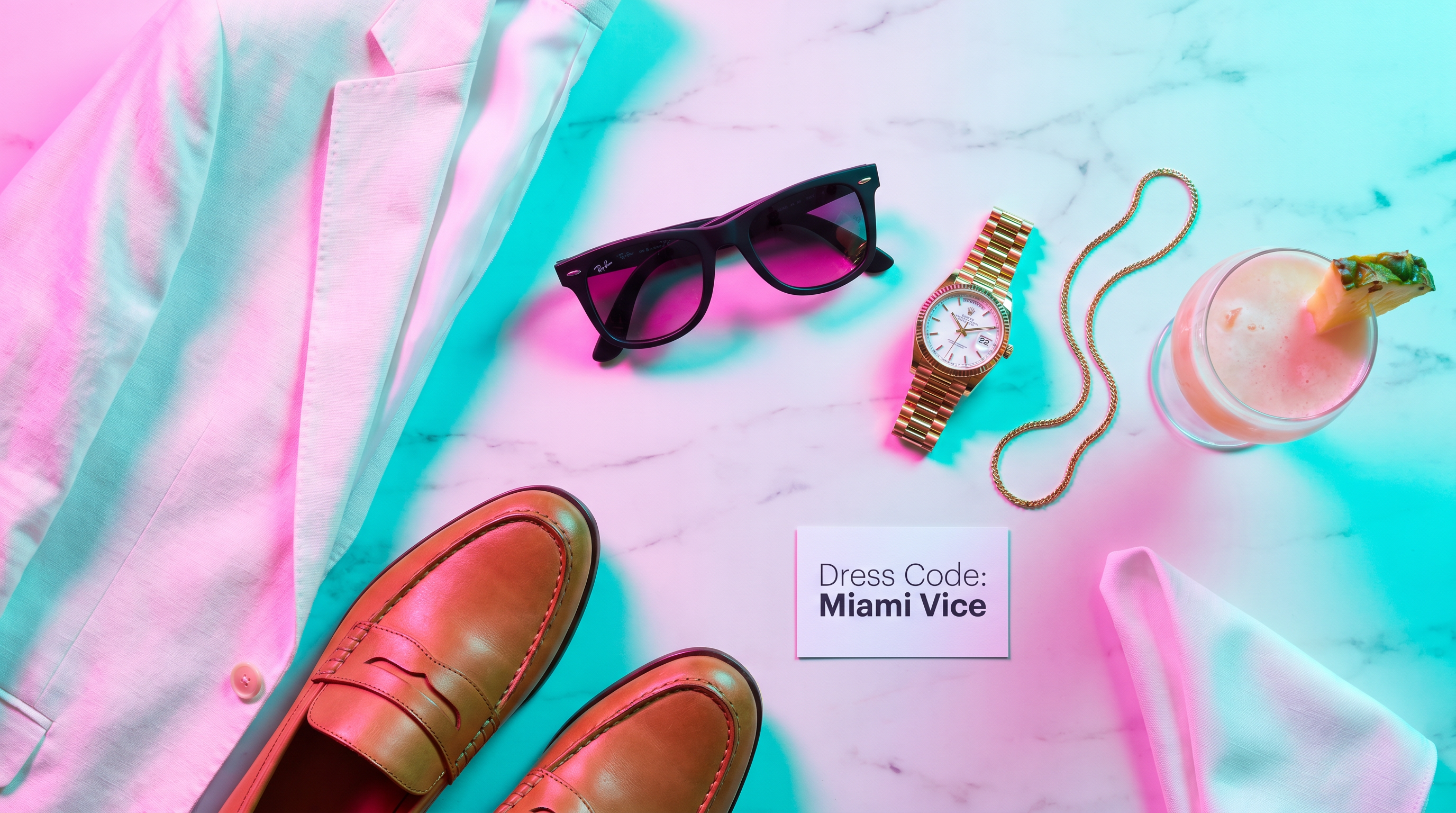 Pastel tailoring and bold accessories define the night's style.